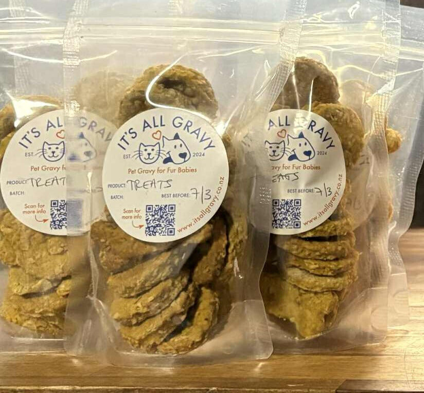 Packaged Pet Treats with a picture of a dog and a cat.  "Pet Gravy for Fur Babies"